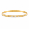 A thin yellow gold bangle bracelet featuring a row of small clear pavé-set round stones along the front edge, shown on a plain white background.