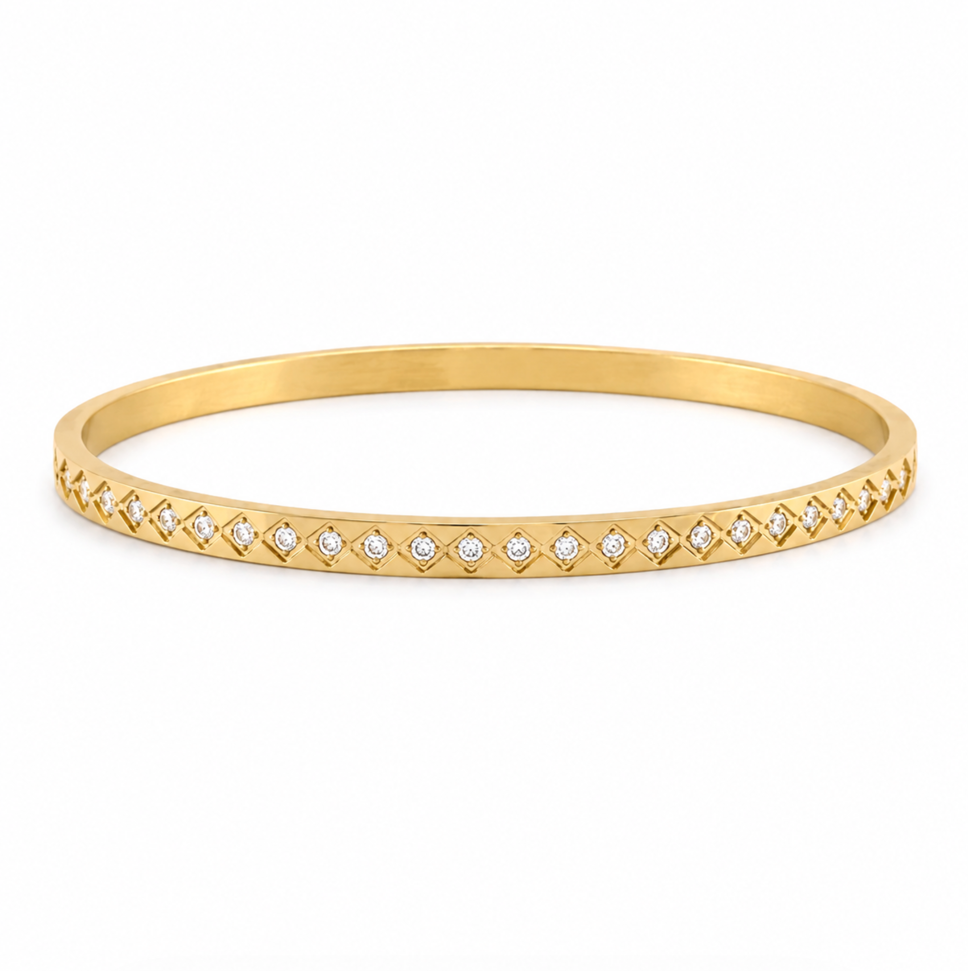 A thin yellow gold bangle bracelet featuring a row of small clear pavé-set round stones along the front edge, shown on a plain white background.
